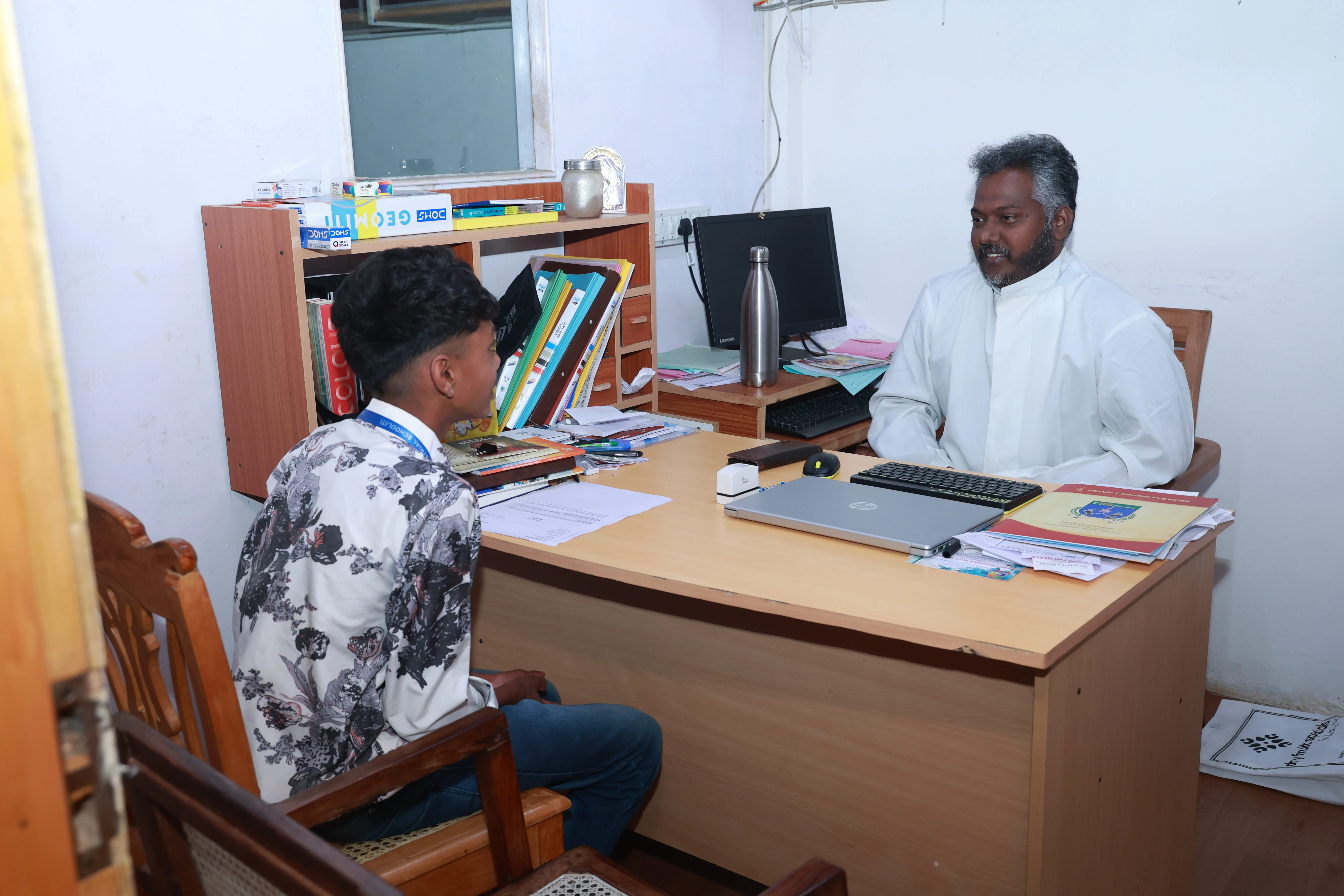 Director of St. Joseph ITI Ooty in counselling session with a student